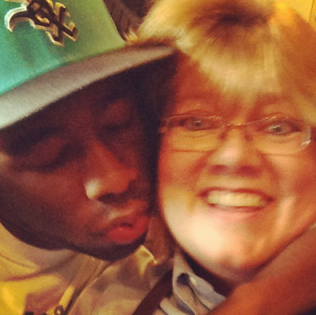 This is Tyler, The Creator kissing some woman.