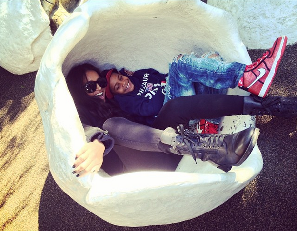 Ciara hangs out with Kiyan in a shell.