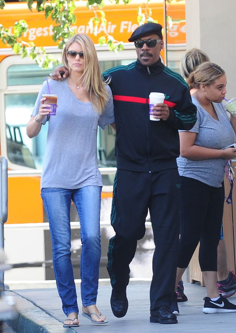 Coupledom: Eddie Murphy and Paige Butcher look might cozy as they go for a coffee run.