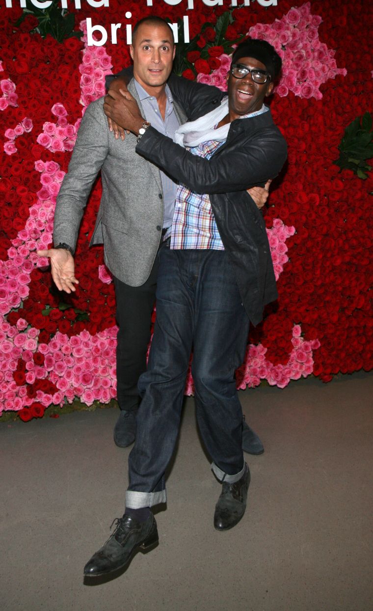 Nigel Barker and J. Alexander hug it out before heading in to the Pamella Roland Fall 2015 bridal show.