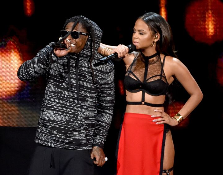 Weezy and Christina are lighting it up as they perform their single, “Start A Fire.”