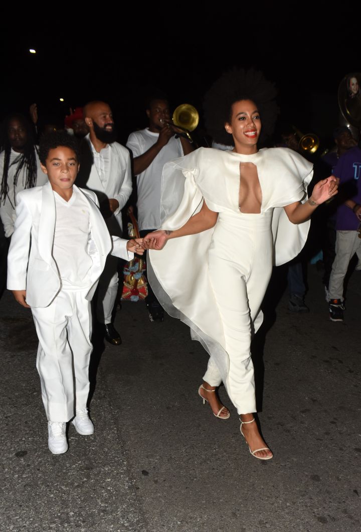 Solange holding hands with her first leading man, her son Julez.