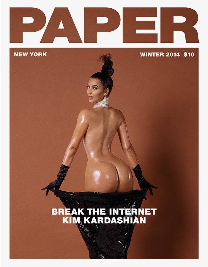 Kim Kardashian puts her famous booty front and center for PAPER magazine.