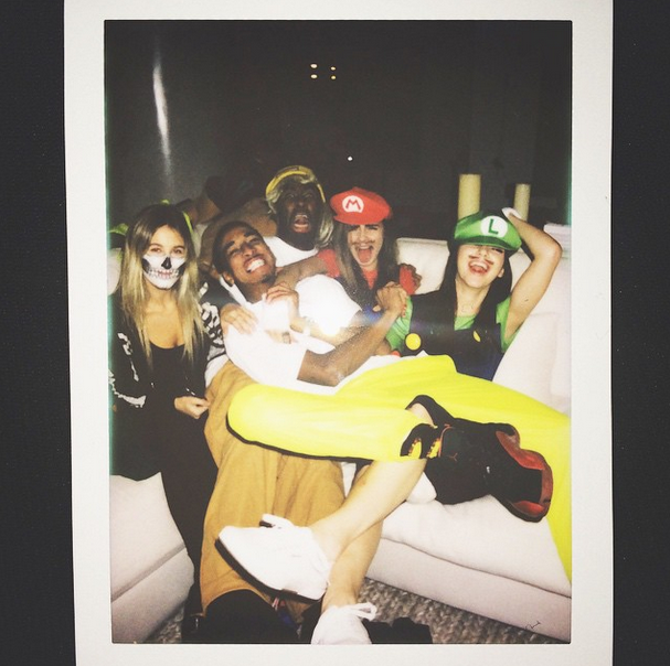 Kendall Jenner hangs with friends as Mario.