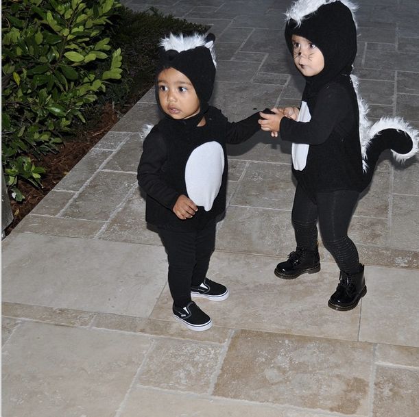 North West and Penelope Disick both dress as skunks!