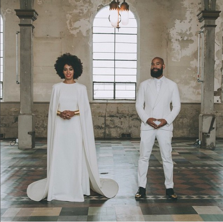 Creatives Solange and Alan Ferguson stand together cool and classic in white.