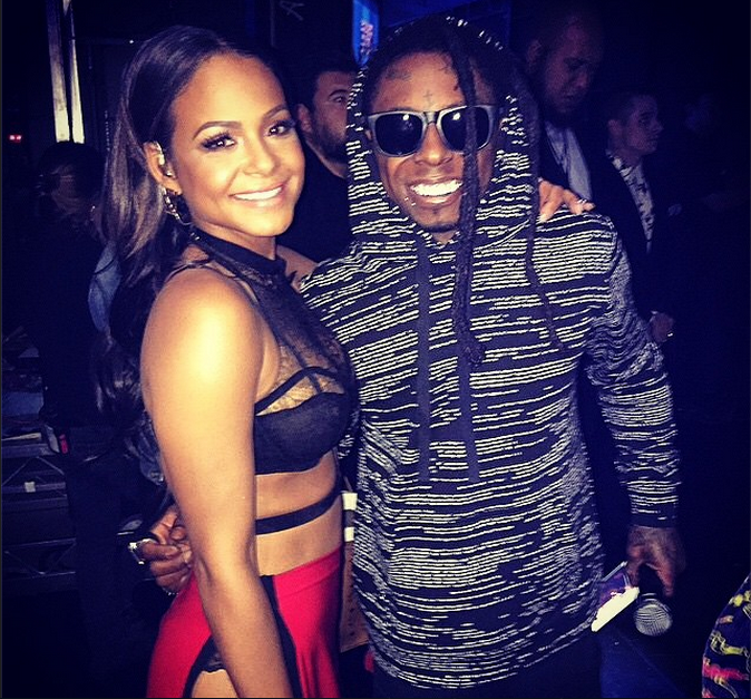 Tunechi and Christina are all smiles at the 2014 American Music Awards.