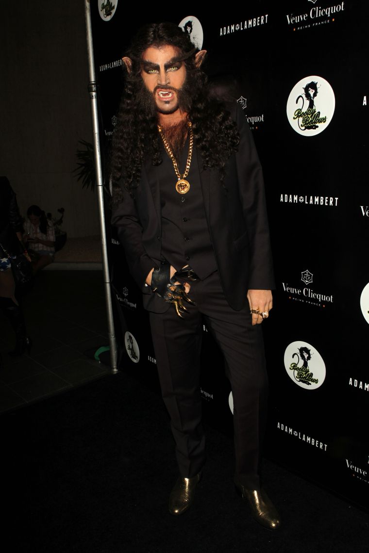 Adam Lambert channels his Wolverine at his Halloween party.