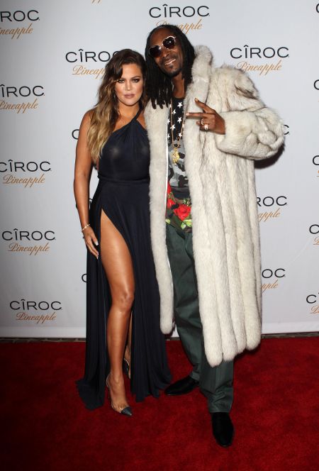 Khloe Kardashian poses it up with Snoop Dogg.