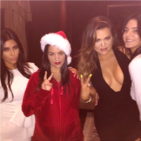 Kim, Kourt, Kendall, and Khloe pose for a photo.