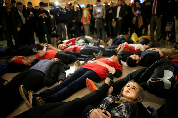 Protesters stage a ‘die-in’ following Eric Garner grand jury decision.
