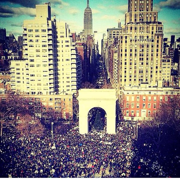 Thousands gather in Washington Square Park before marching uptown.