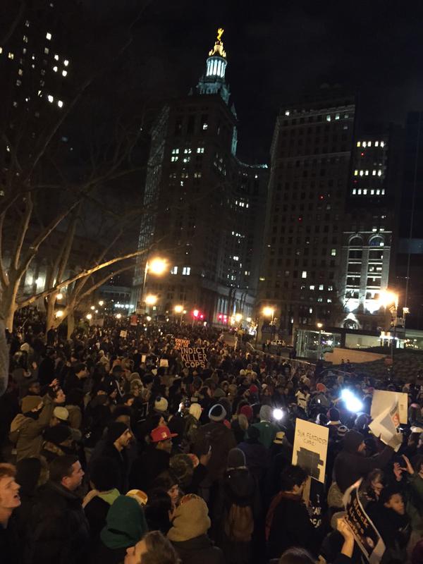 Thousands gather near the NYPD headquarters.