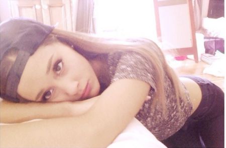 Snapbacks and Sad Looking Selfies