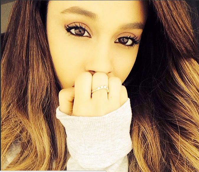 Probably Trying To Figure Out How To Switch Her Ponytail Up…