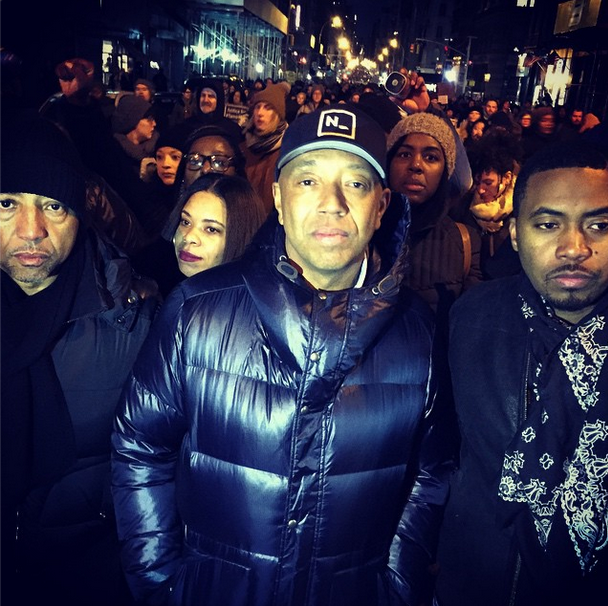 Kevin Liles, Russell Simmons, and Nas help lead the march in NYC.