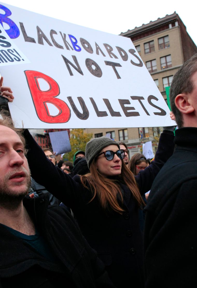 Anne Hathaway protested at Union Square for the Occupy Wall Street campaign with her boyfriend Adam Shulman.