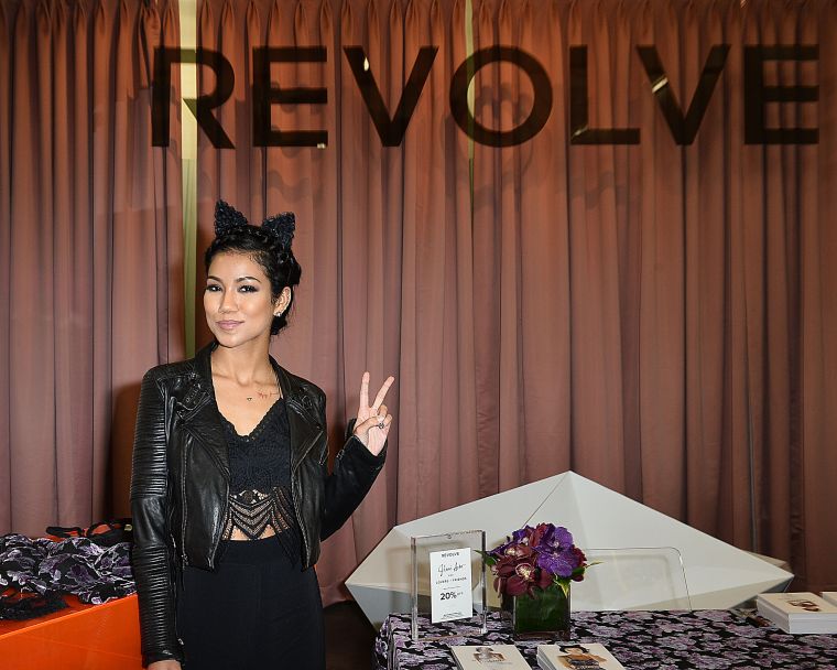 Jhene Aiko flashed the peace sign with clothing brand Lovers & Friends at The REVOLVE Grove Pop-Up Store.