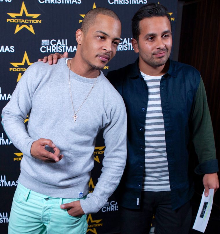 T.I. and Mando hit up the Cali Christmas concert red carpet.