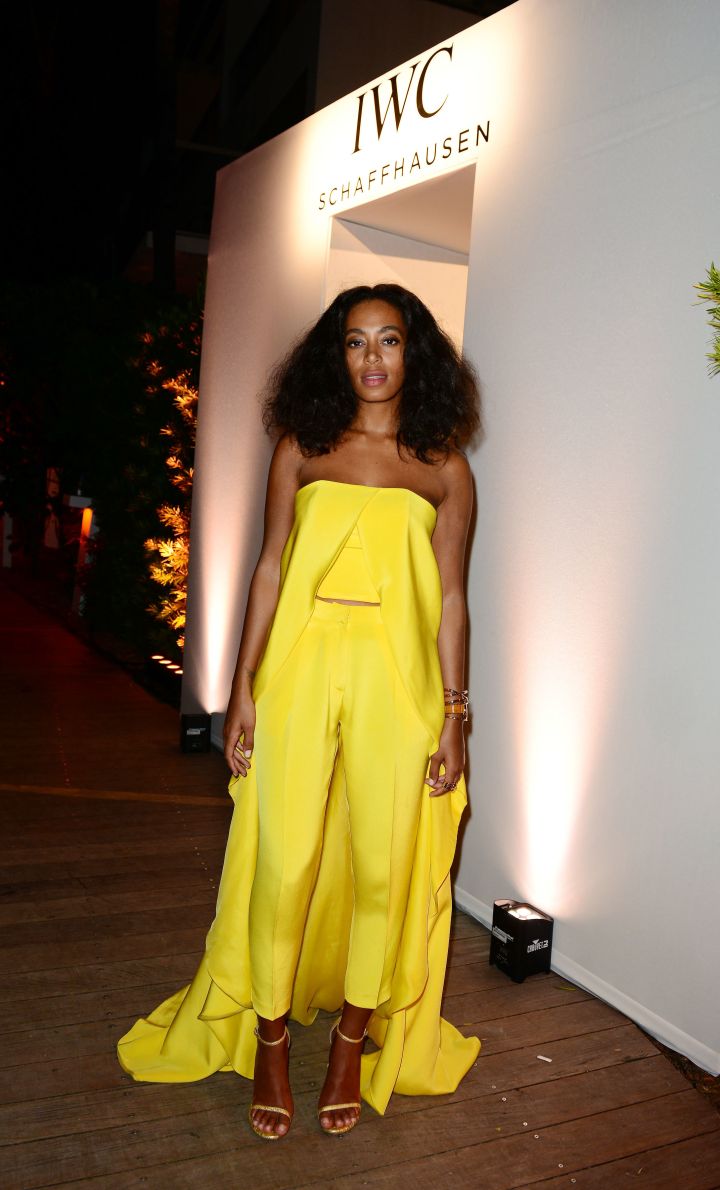 Vision of beauty. Solange Knowles keeps it cute in a yellow dress at the “Timeless Portofino” Gala Event at Art Basel Miami.