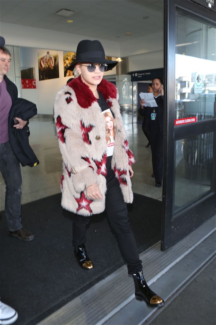 Rita Ora strutted through Los Angeles International Airport looking like a model.
