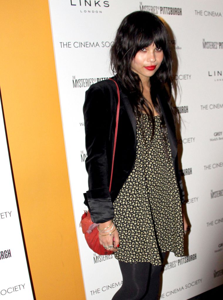 Zoe chops her bangs for a slightly darker look.