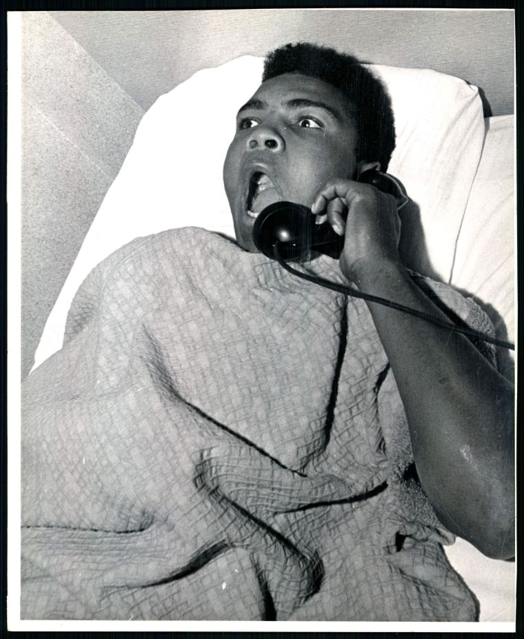 After a night of making Denver, and Sonny Liston in particular, aware of his presence, Cassius Clay and troupe found accommodations at the Albany Hotel. The Denver Post caught him in bed Tuesday morning asking for the time of day and telling hotel employees what a great night he had Monday on the Liston home’s front lawn.
