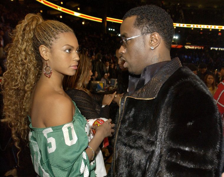 Bey was so not feeling Diddy at the 2003 NBA All Star game.