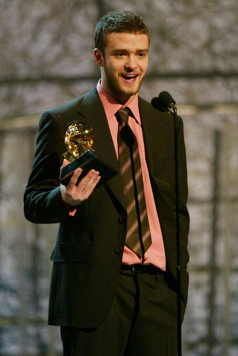 After disbanding N’Sync and consciously uncoupling from Britney Spears, Justin released his debut album “Justified,” which earned him two Grammys.