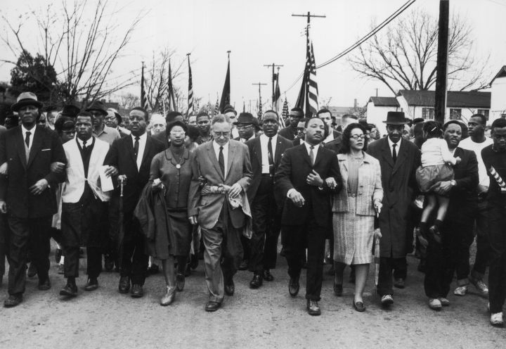 The Kings march in Selma on behalf of the Selma Voting Rights Movement. The three marches influenced Congress to create the Voting Rights Act of 1965.