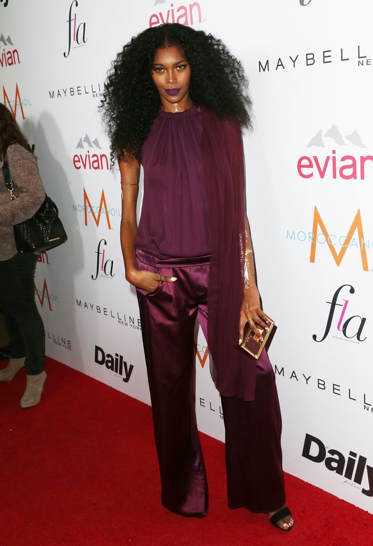 Supermodel Jessica White went goth in a purple jumpsuit.