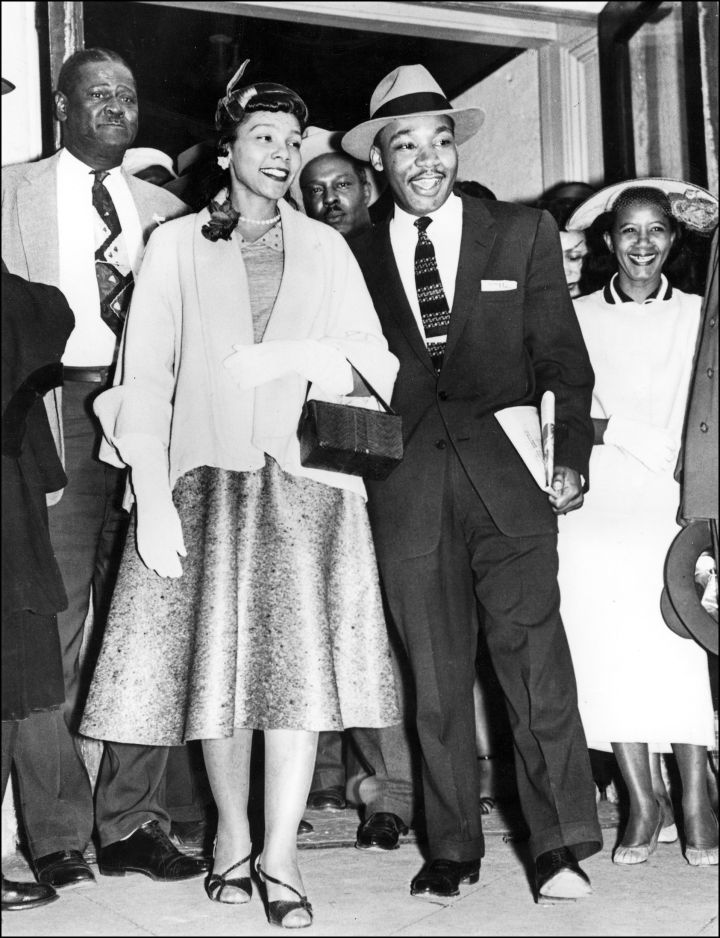 The couple leaves the Montgomery Court House after King was found guilty on charges of conspiring to boycott segregated city buses. He later appealed the charges.
