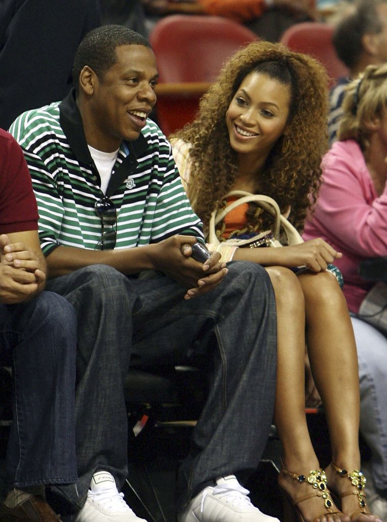 Young Bonnie n' Clyde have fun at a Toronto Raptors vs. Miami Heat game.