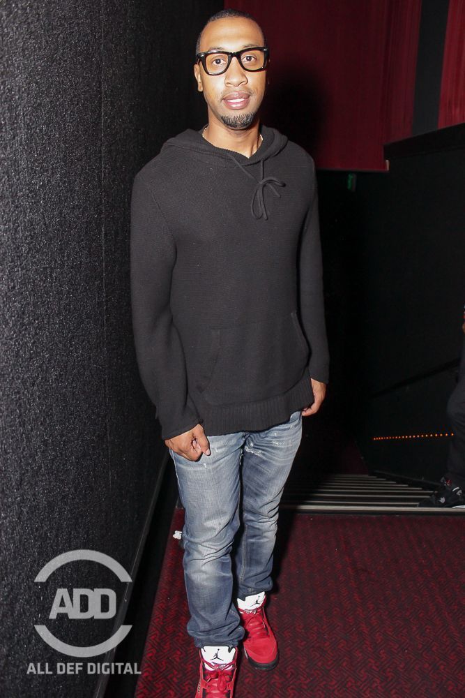 Cortez Bryant kept is simple and comfortable in a sweater and some jeans.