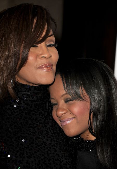 Bobbi hugs her mother at the 2011 Pre-GRAMMY Gala and Salute To Industry Icons Honoring David Geffen.