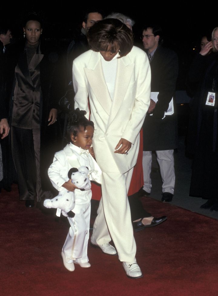 Singer Whitney Houston and daughter Bobbi Kristina Brown attend “The Preacher’s Wife” premiere together in New York City on December 9, 1996.