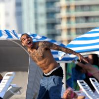 Chris Brown shirtless at the beach