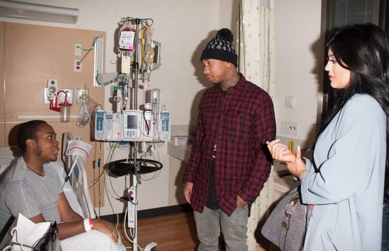 Kylie and Tyga do a good deed together.