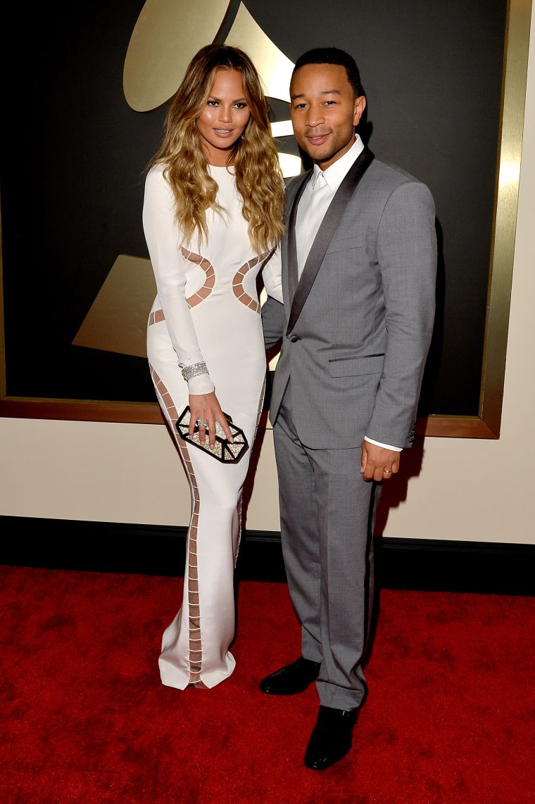 Chrissy Teigen and John Legend (in Dolce & Gabbana)