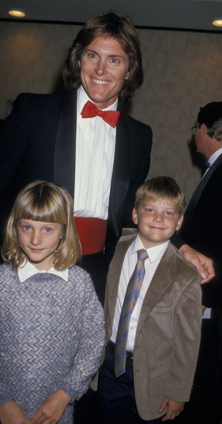 Bruce gets in close for a photo with the kiddies.