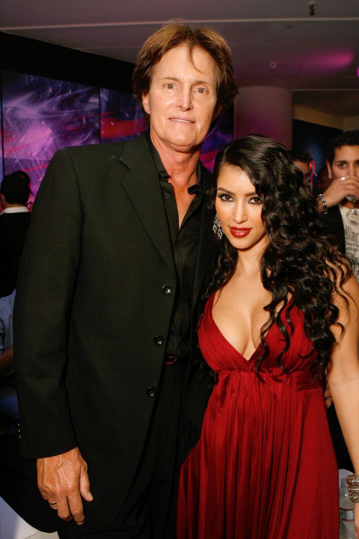 Bruce Jenner accompanies Kim on the red carpet.