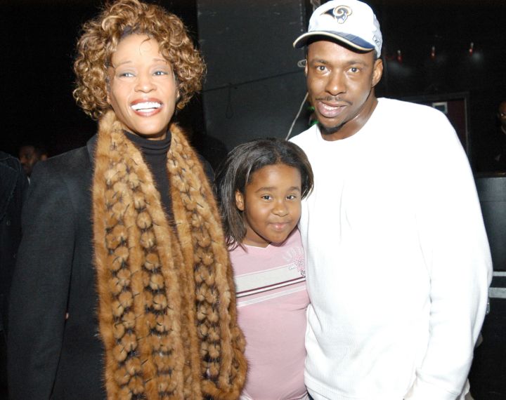 Whitney, Bobby, and Bobbi smile during Praise Power in 2003.