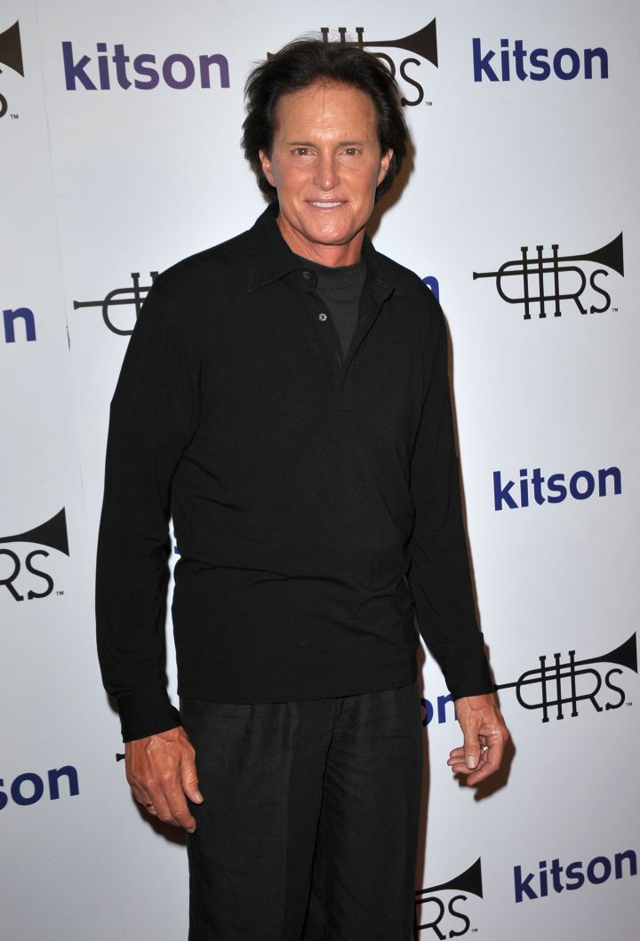 Bruce shows off his million dollar smile in all black.