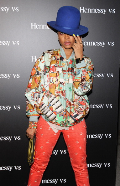 Only Erykah Badu can make a colorful windbreaker look this cool.
