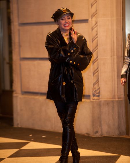 Miley Cyrus makes her way inside.