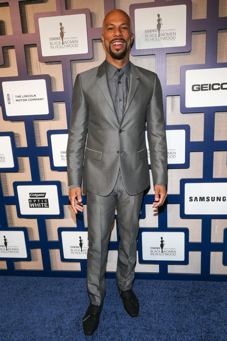 Common was dapper as usual in this metallic gray suit.