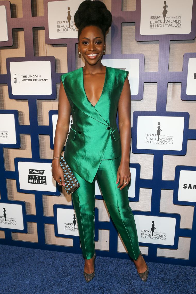 Teyonah Parris stunned in this metallic green pantsuit.