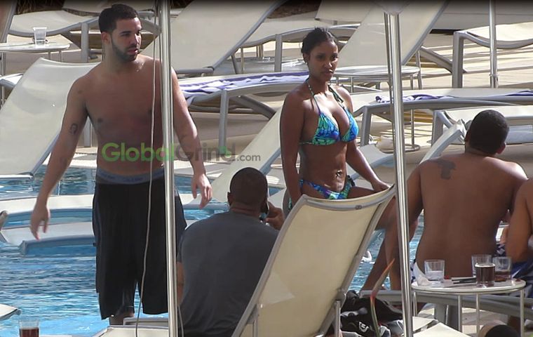 Drake and his latest boo Bernice Burgos were spotted relaxing by the hotel pool in Perth, Western Australia.
