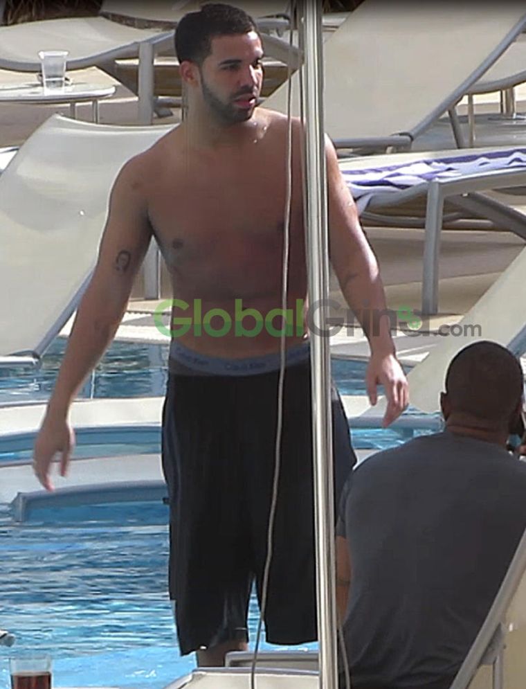 Drake and his latest boo Bernice Burgos were spotted relaxing by the hotel pool in Perth, Western Australia.