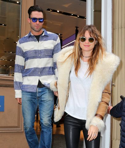 Adam Levine and wife Behati Prinsloo go shopping at the Nike store